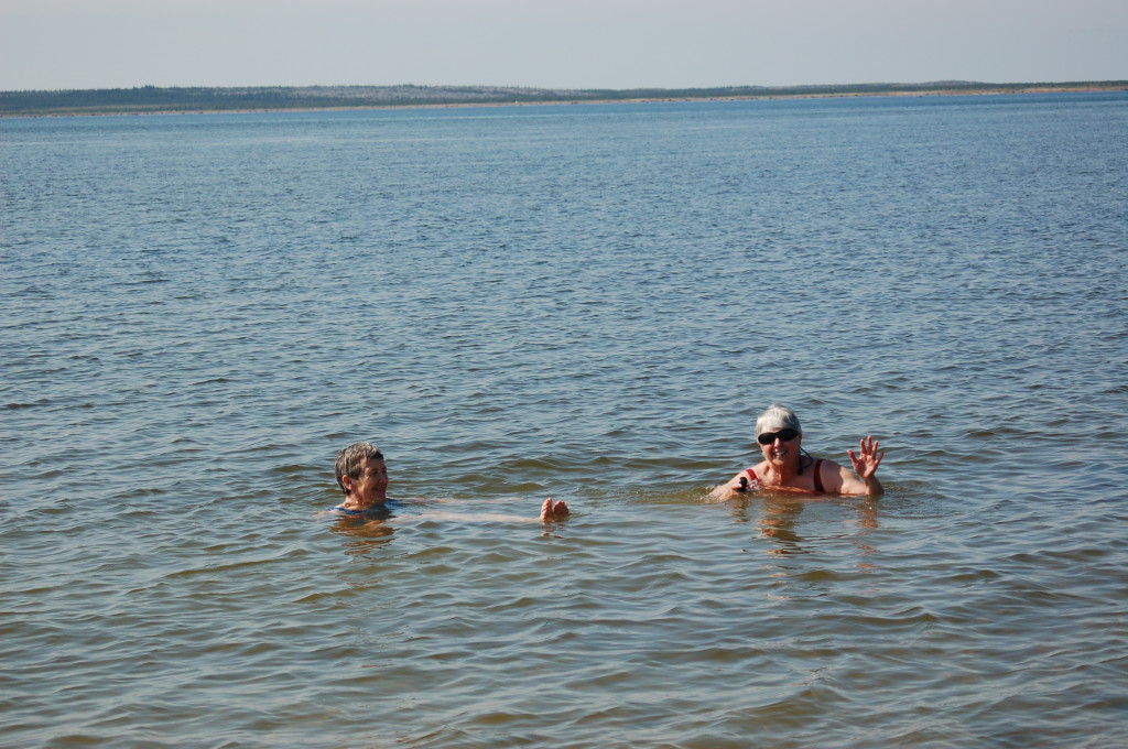 Natural Habitat travelers swimming in the Churchill River. Steve Selden photo.