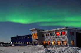 Churchill Northern Studies Center with aurora borealis. Churchill, Manitoba.