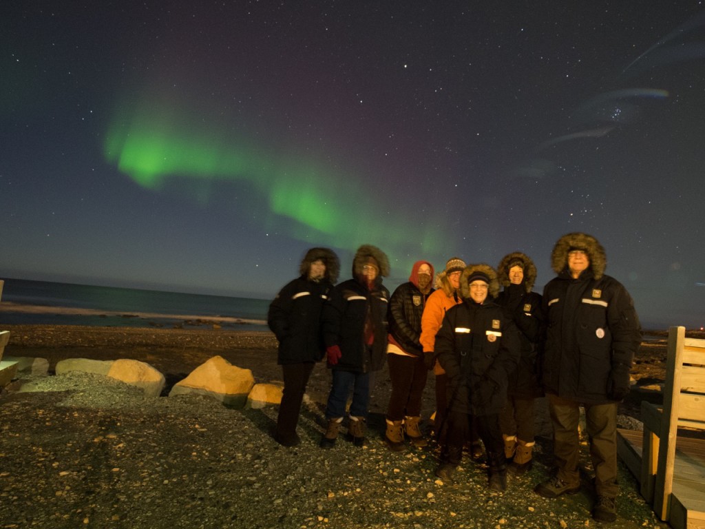 Natural Habitat Adventures travelers and northern lights.