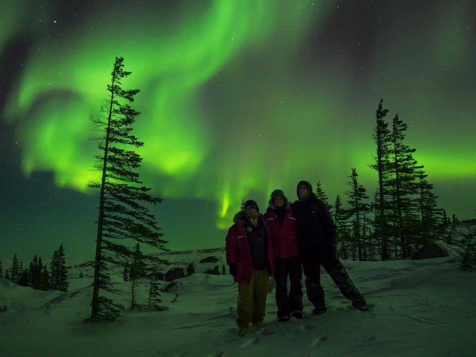 Natural Habitat adventure guides under churchill, manitoba northern lights