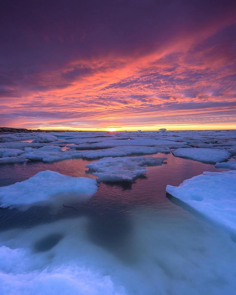 sunset over ice floes in Churchill