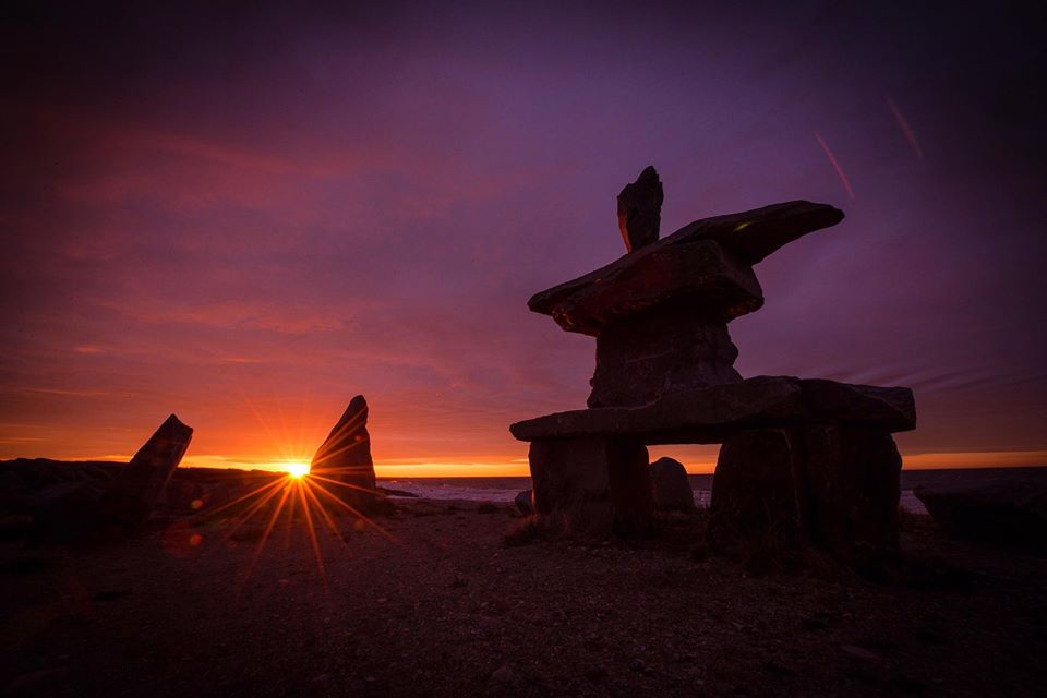 Churchill Sunset over inukshuk