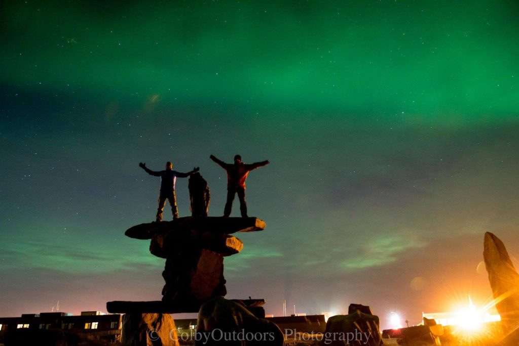 Inukshuk in Churchill aurora borealis