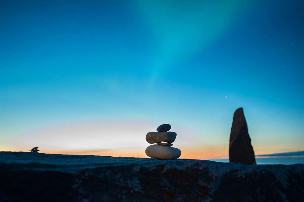 Modern inukshuk on the precambrian sheild in Churchill